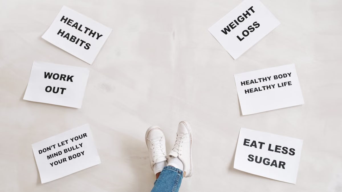 Inspirational health and fitness messages with shoe-clad feet, promoting healthy habits and wellbeing.